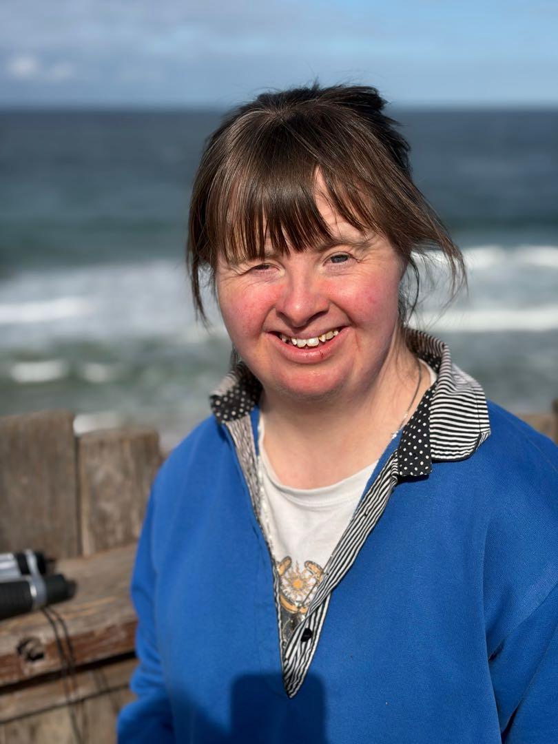 MindOn Care participant enjoying an accessible beach holiday