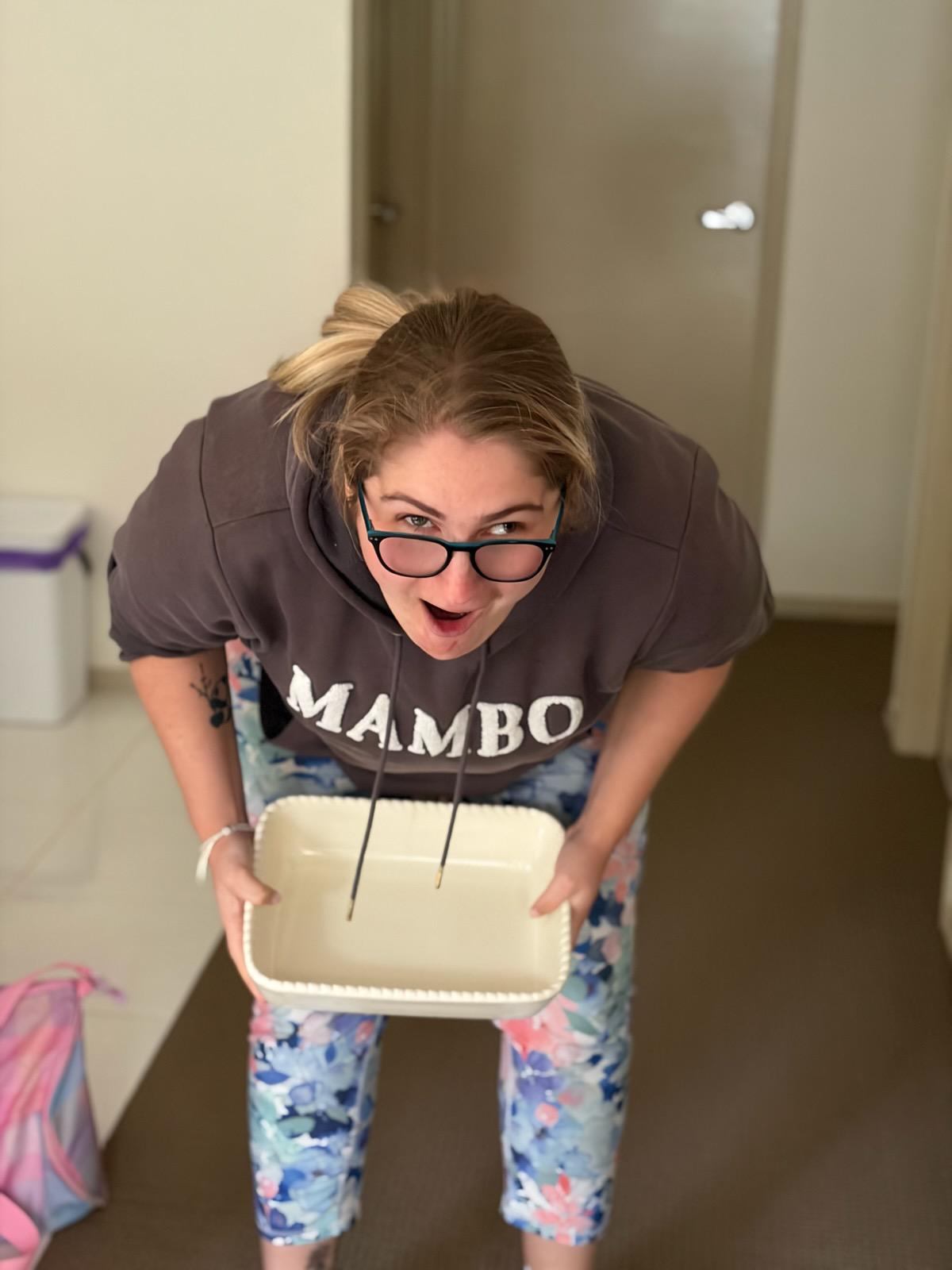 MindOn Care participant helping with laundry at home