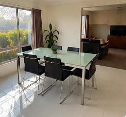 Bright dining area of the Warrnambool SIL home with garden views